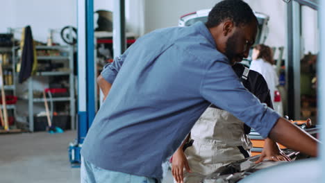 employee does client car maintenance