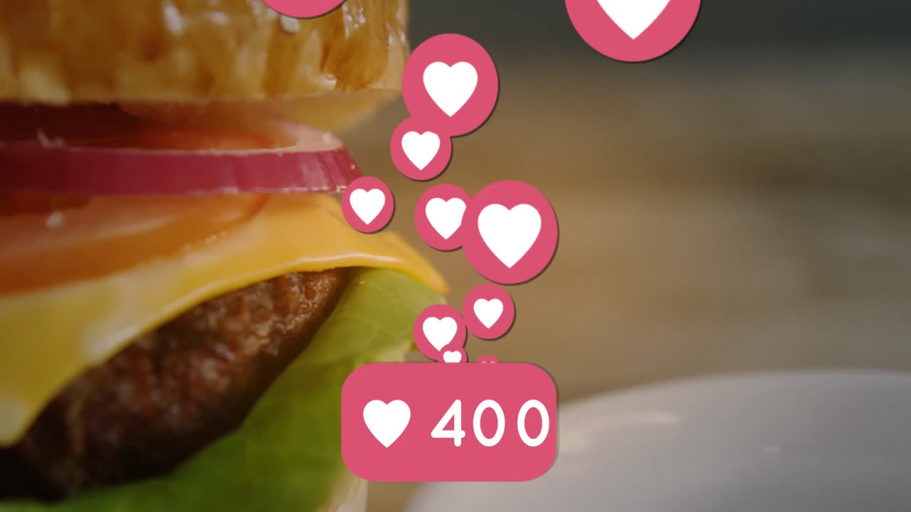 animación de corazones y reacciones en las redes sociales sobre una hamburguesa con queso