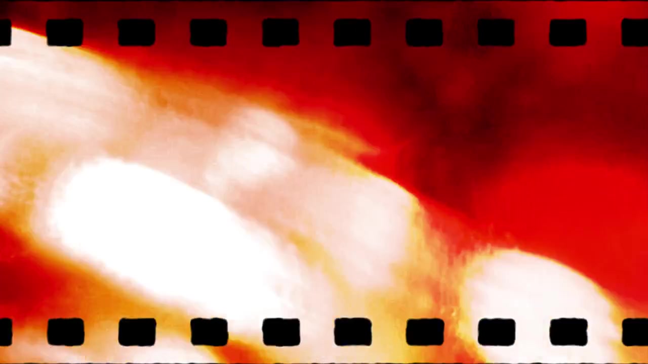 Sovrapposizione vintage di bobina di pellicola con perdite di luce rosse e grana