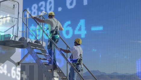 subiendo escaleras industriales, trabajadores con equipo de seguridad sobre animación de datos financieros