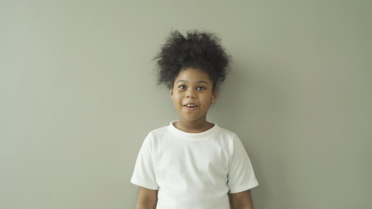 Portrait of happy smiling young black African American student girl studying from home and talking to friends in webcam group video call conference online. People lifestyle