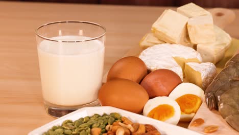 variety of protein sources on a wooden table