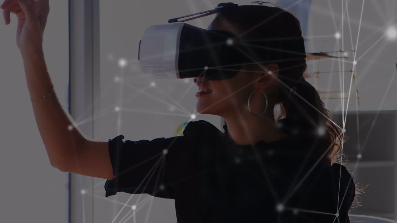 Animation of network of connections over businesswoman wearing vr headsets