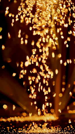 abstract golden sparks on a dark background