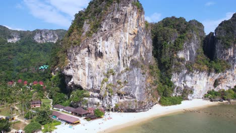 drone shot of limestone cliffs above railway beach. scenic landscape of krabi, thailand