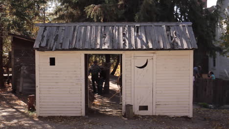 old outhouse in a historical setting