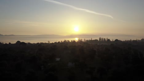 Silhouette-of-Lesbos-island-and-sun-reflection-in-sea-during-sunset