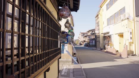 peaceful afternoon in japanese takayama neighborhood, wind-chimes blowing