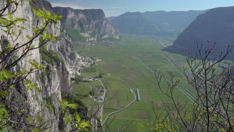 view across the adige valley towards roverè della luna, trentino, italy