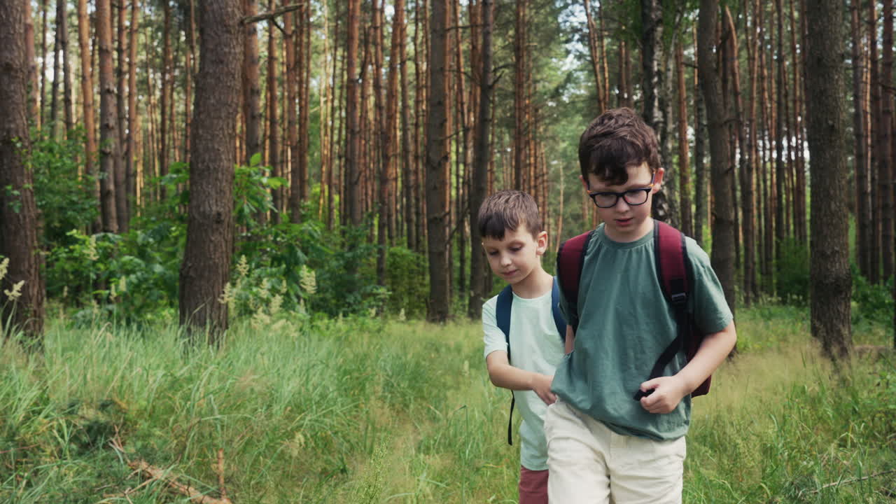 Two kids in the forest