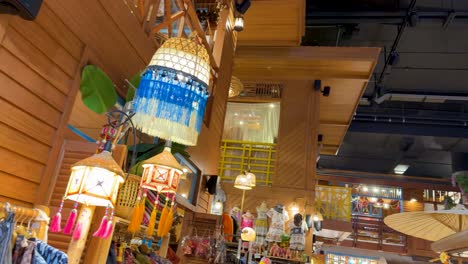 vibrant shopping area with hanging lanterns