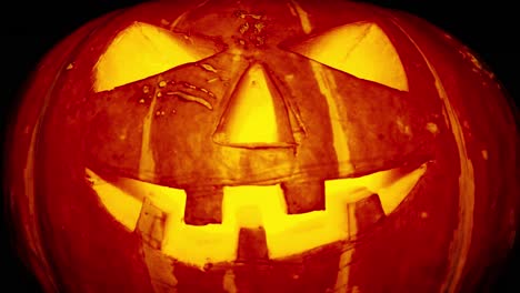 scary old jack-o-lantern on black background.