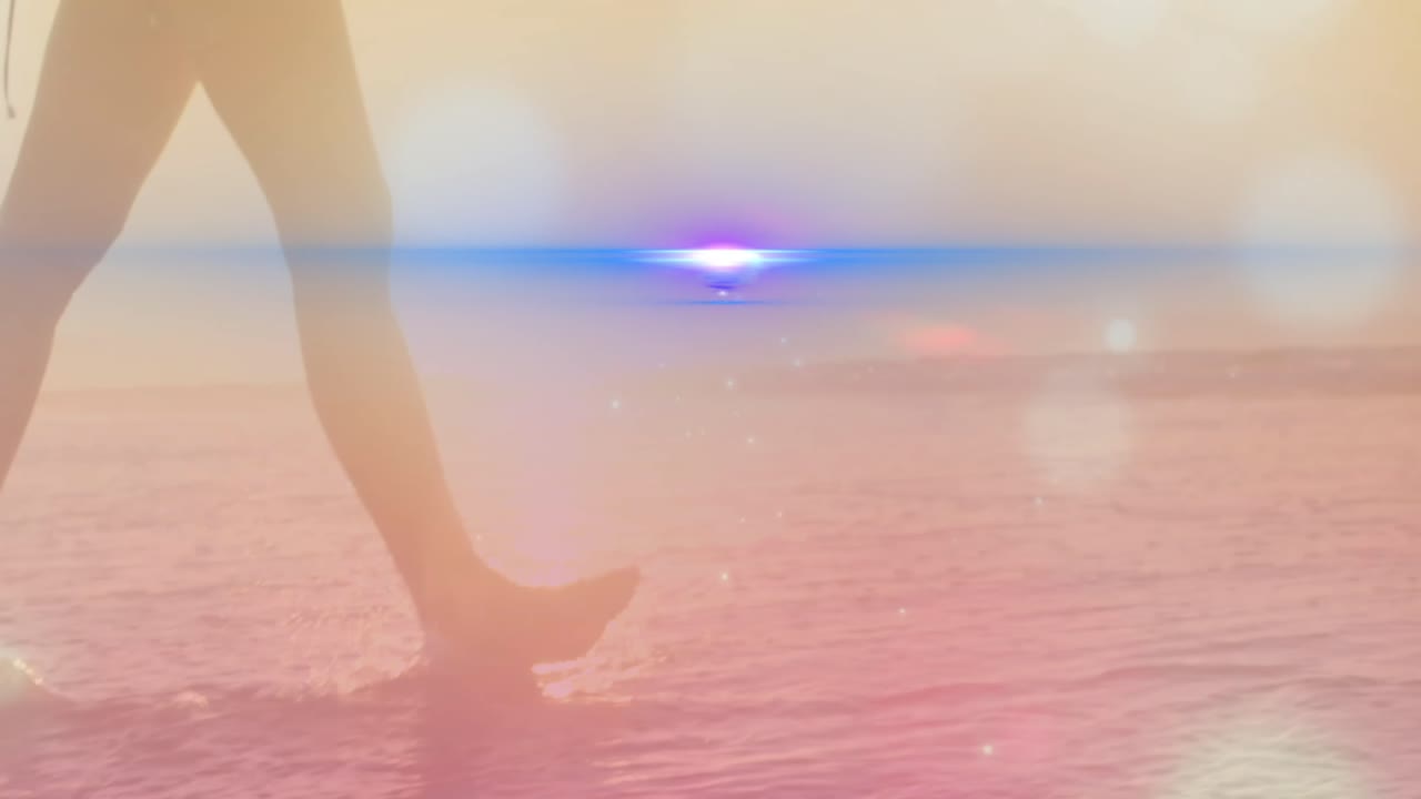 해변에 있는 백인 여성 위에 있는 빛의 반점들의 애니메이션