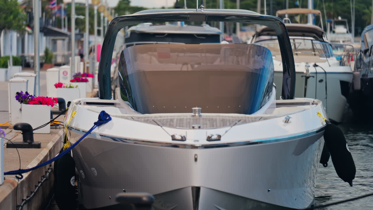 Close up of a boat docked in Port Vauban in Antibes, France in the evening