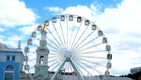 close-up big white ferris wheel rotates in kiev city,