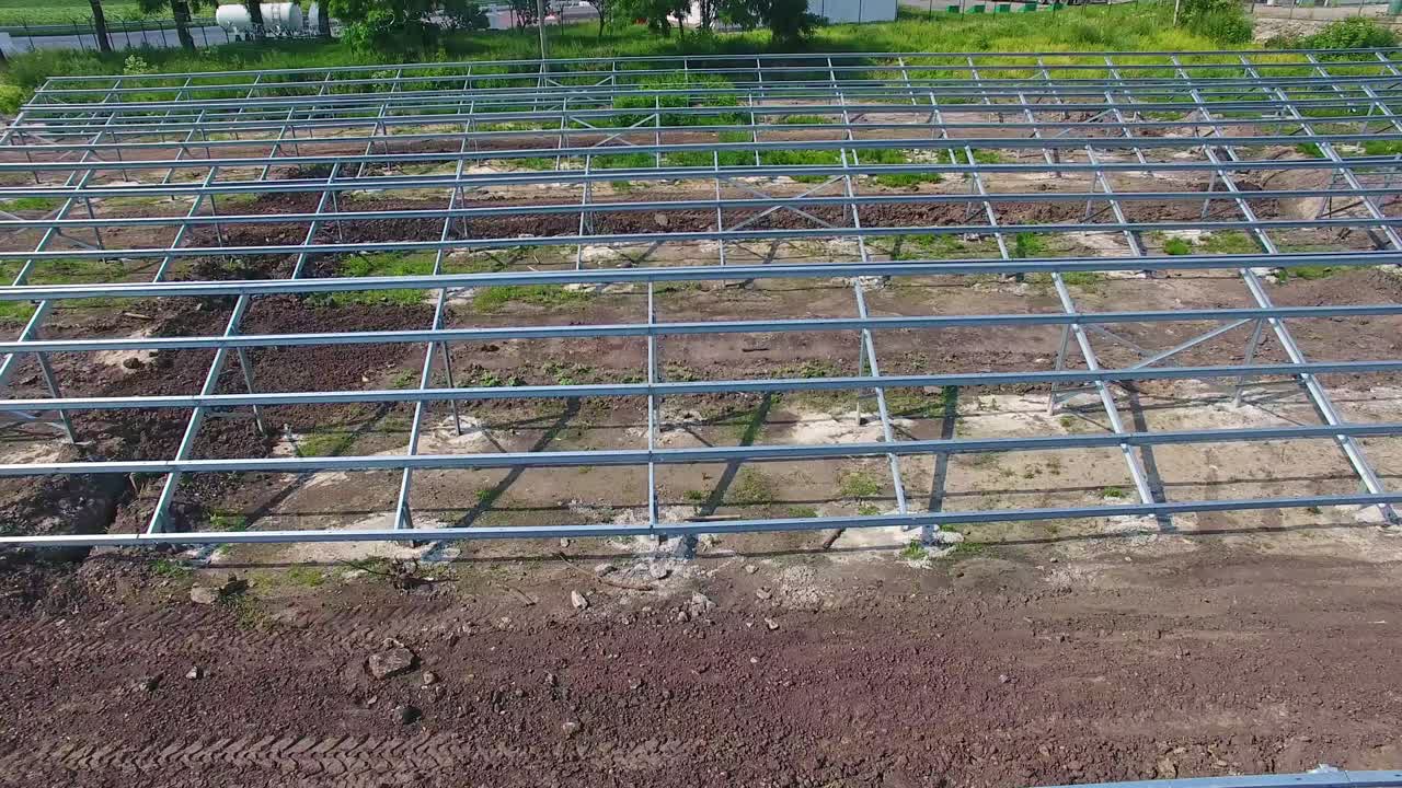 Drone shot of construction site. Aerial drone view of industrial working on construction site