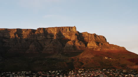 sunset drone shot of table mountain in cape town, south africa