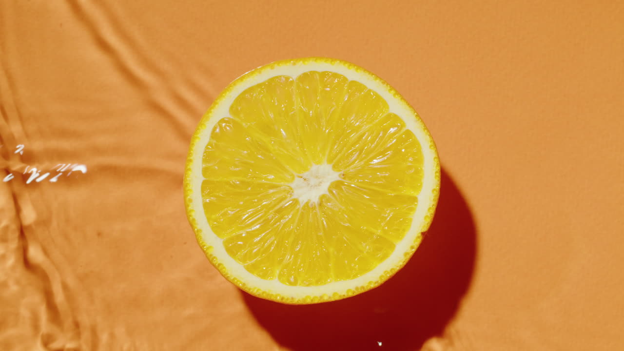 Orange Slice on Water Splash