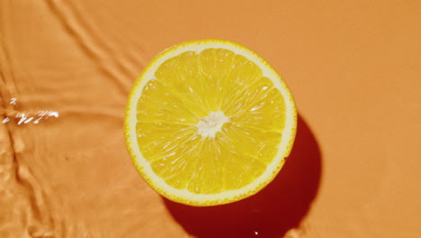 orange slice on water splash