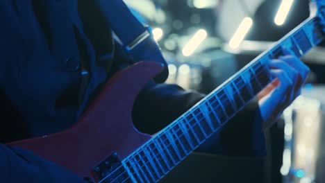 guitar player on stage at a concert rocking the audience