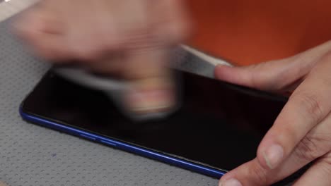 cleaning a smartphone screen