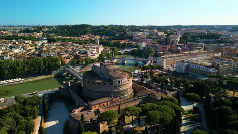 beautiful orbiting drone shot above castel sant'angelo, reveals st. peter's basilica