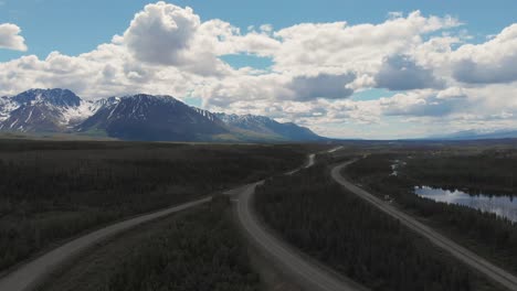 4K-Drone-Video-of-Mountain-Peaks-and-Granite-Creek-near-Denali-National-Park-in-Alaska-on-Sunny-Summer-Day