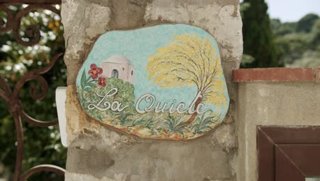 Close up shot of a beautiful handmade sign on the roads of Capri, in Italy - 01