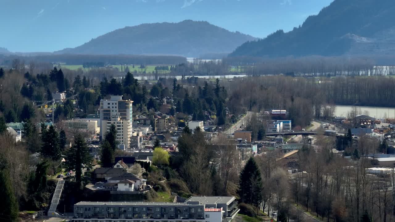Mountain Range Against Blue Sky Seen From Mission City In BC, Canada. - wide shot