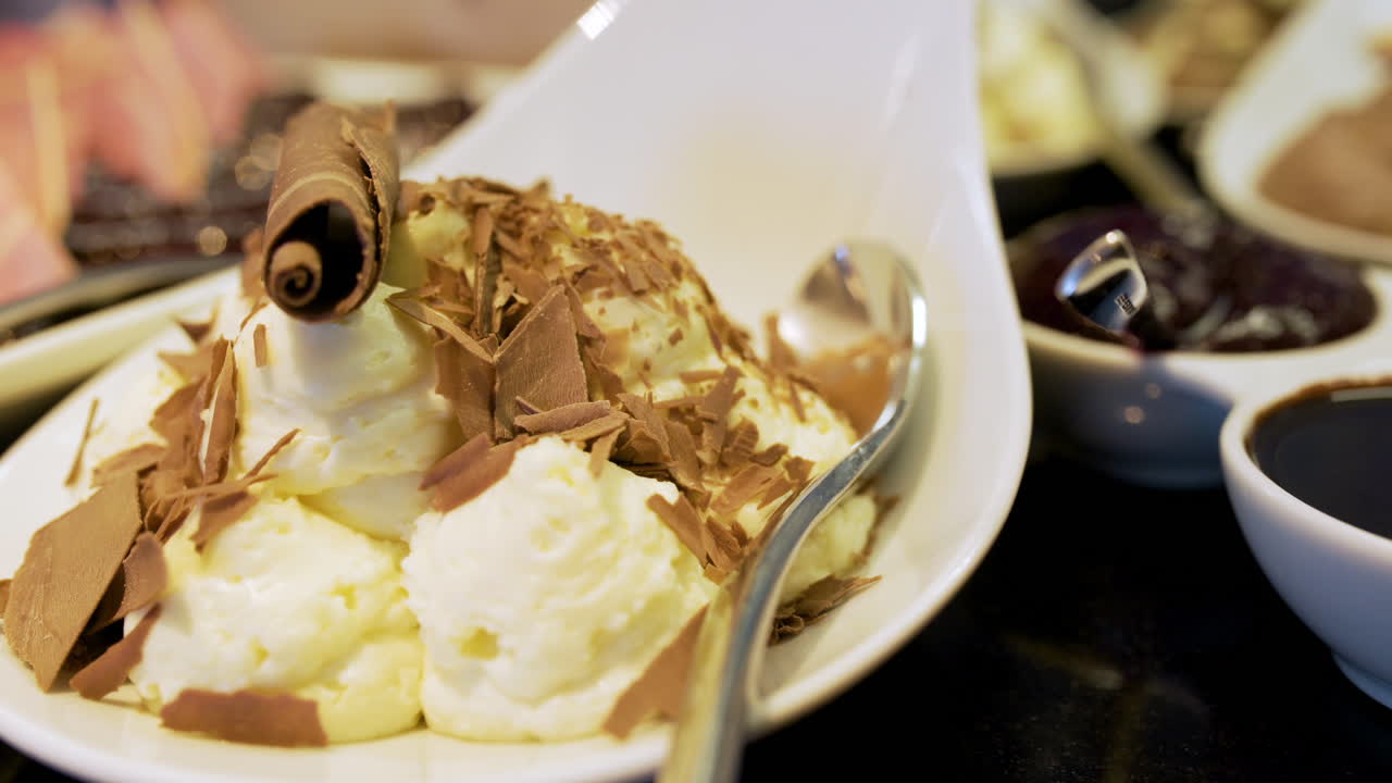 Close Up Of Fresh Ice Cream Dessert Sprinkled With Chocolate