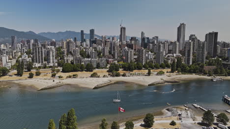 vancouver bc canada aerial v107 panoramic view drone flyover false creek capturing sandy beach, west end, downtown cityscape and granville island views - shot with mavic 3 pro cine - july 2023
