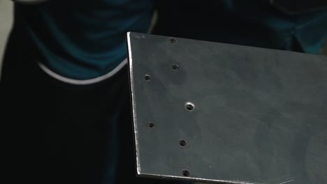 close-up of a grinding wheel cutting or shaping a metal surface, producing vibrant sparks. a powerful depiction of industrial work and precision.