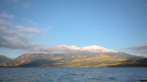 Sun-touching-snowcapped-Rinker-Peak-in-Leadville-Colorado-during-the-fall