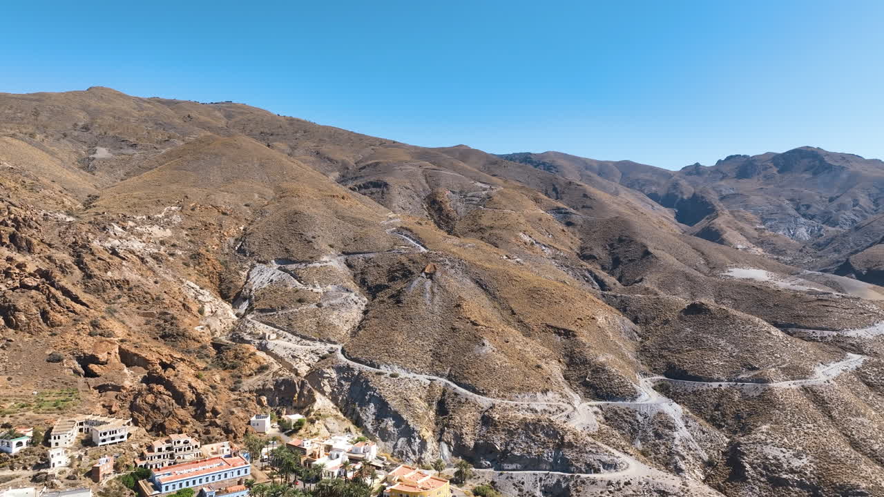 Flight over Almeria's iconic mountainside spa oasis and village Sierra Alhamilla