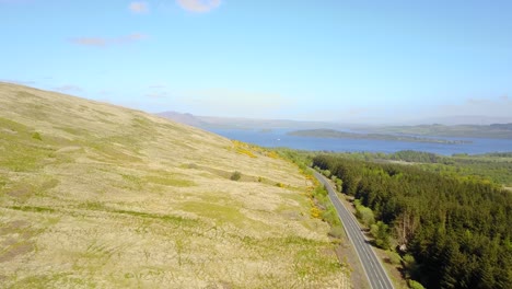 scottish pristine landscape with lomond lake in background