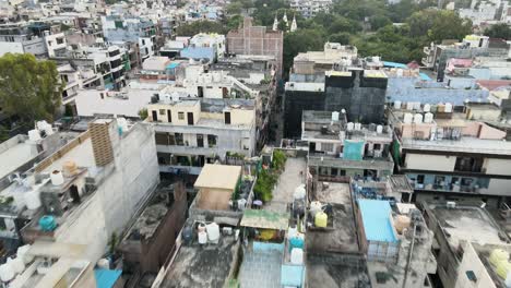 4K-Aerial-Shots-of-New-Delhi-Residential-Suburbs-on-a-beautiful-day-gliding-over-Rooftops,-streets,-parks-and-markets-in-India