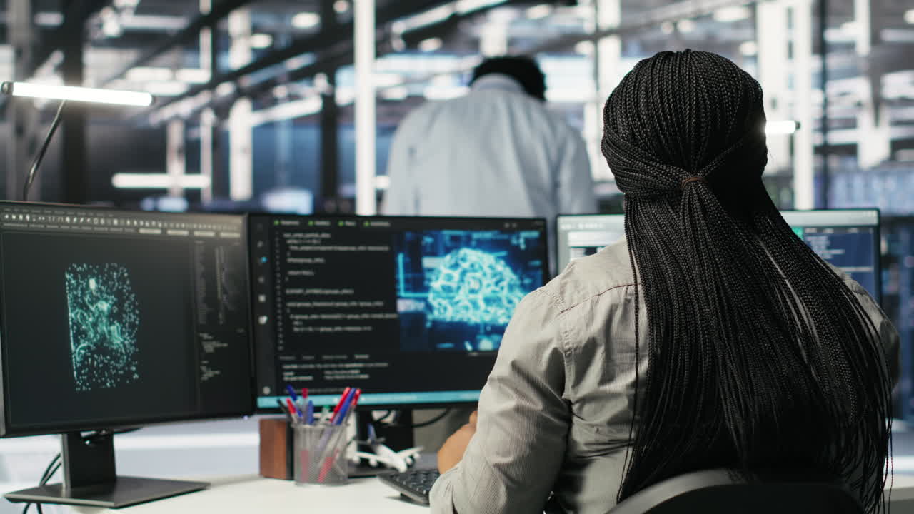 Server farm IT specialist using PC to apply artificial intelligence