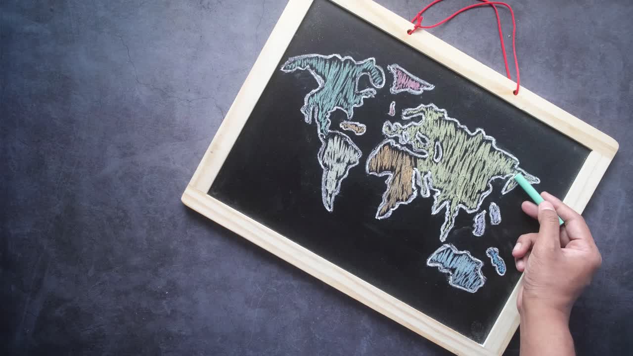 Hand-drawn World Map on a Chalkboard