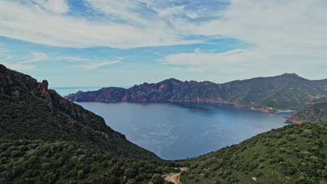 majestic lake in corsica surrounded by mountains