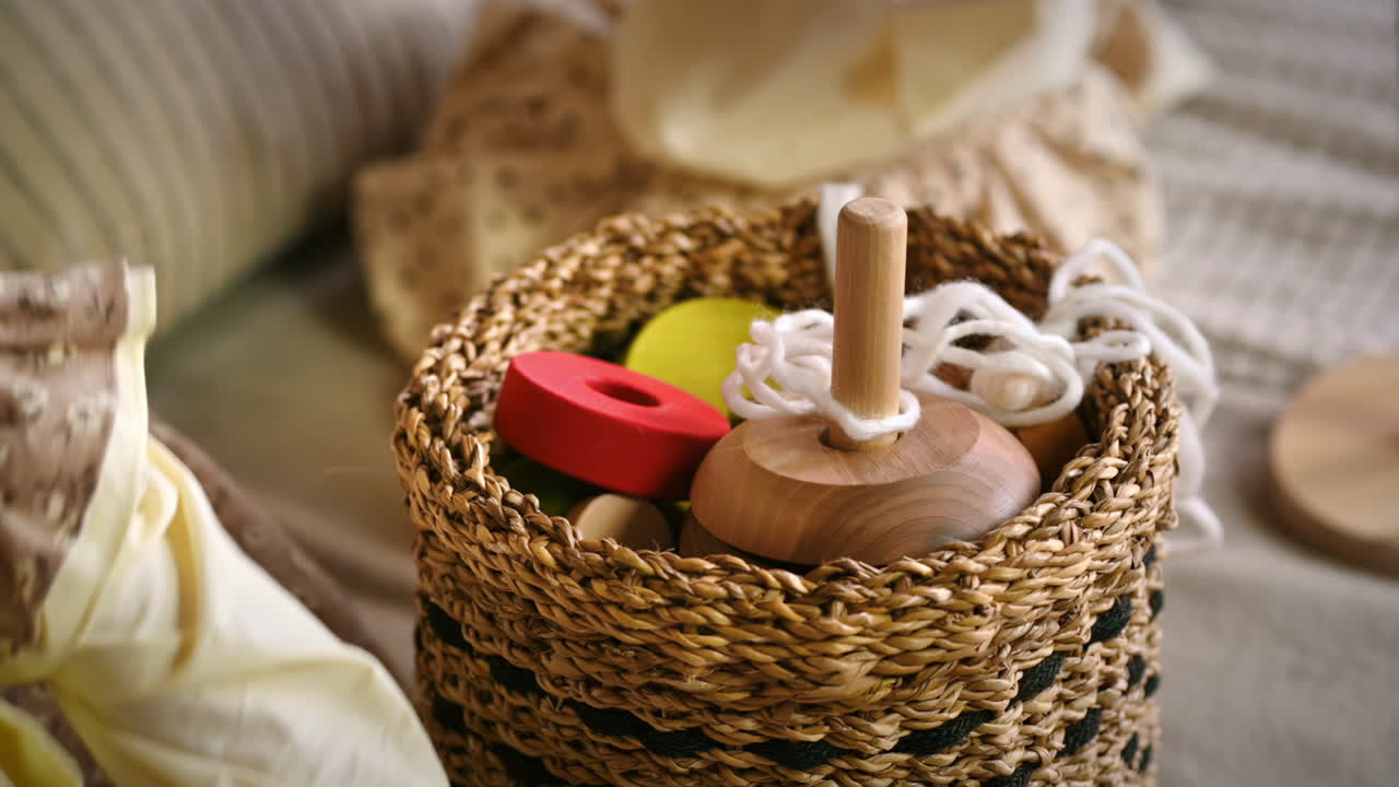 Two little girls taking wooden toys from the basket. Ecological and sustainability concept