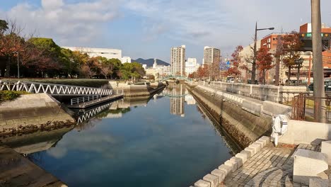 beautiful autmn day in nagasaki view over a canal in the port area