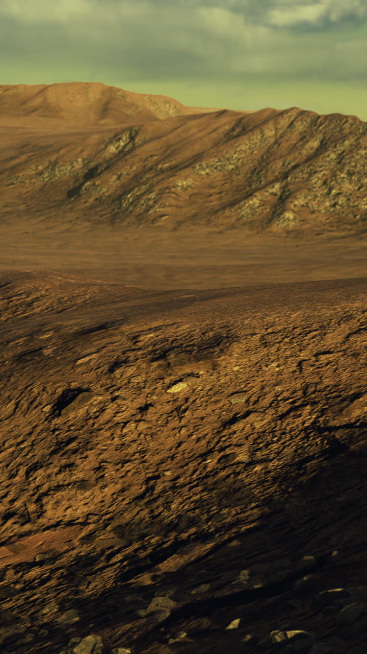 Landscape of rocky terrain under a clear sky during daylight hours