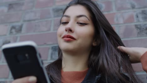 Handheld-view-of-hipster-woman-looking-down-on-her-phone