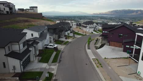 modern homes on neighborhood street, real estate market in lehi, utah - aerial