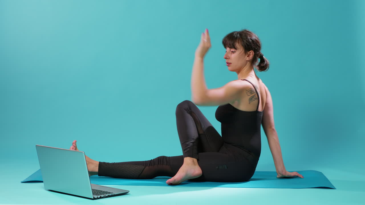 Active person stretching body muscles after fitness training