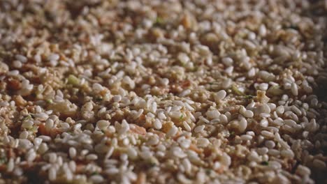 close-up of a healthy vegetarian snack, baked and topped with sesame seeds