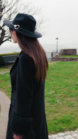 elegant woman walking around the small italian town