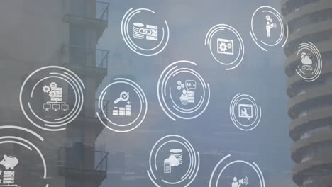 animación de múltiples iconos digitales contra edificios altos y cielo azul