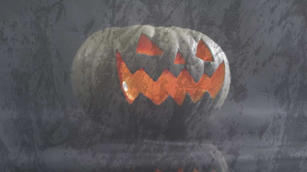 animación de calabaza tallada de halloween sobre un fondo gris