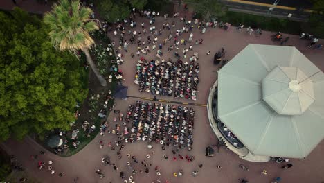 People-Applauding-During-A-Performance-In-Front-Of-La-Glorieta,-Barrancas-De-Belgrano-Park,-Buenos-Aires